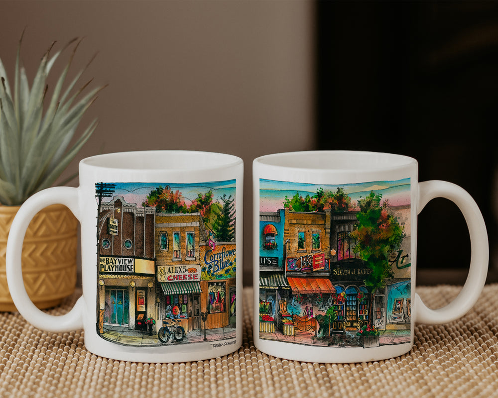 Two Leaside Neighbourhood Toronto Coffee Mugs side by side on table.