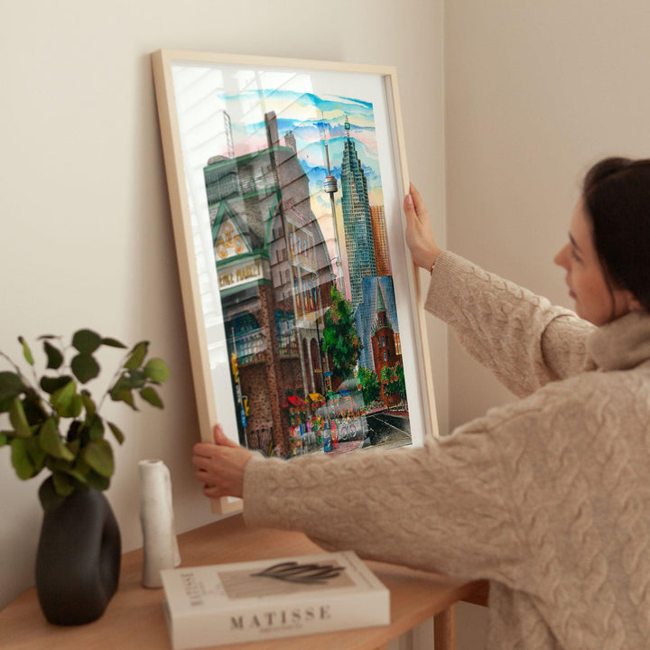 Woman looking at Glass Framed St. Lawrence Market against Wall