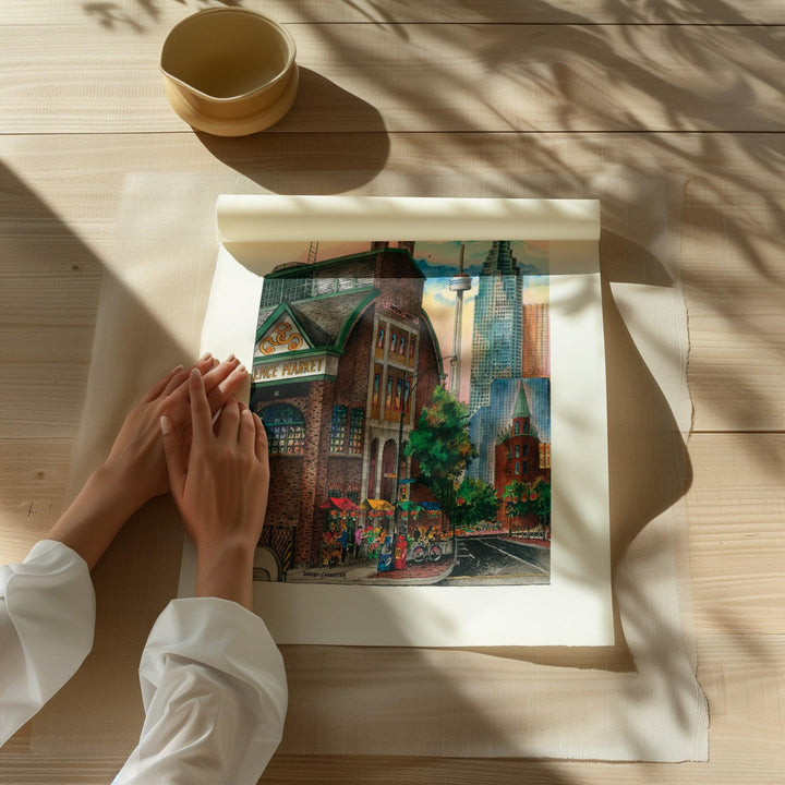 Woman looking at St. Lawrence Market Art print before framing