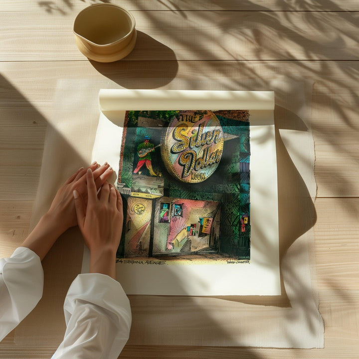 Beautiful illustration of Silver Dollar from Toronto Art Shop on a wooden desk, dappled in sunlight. 