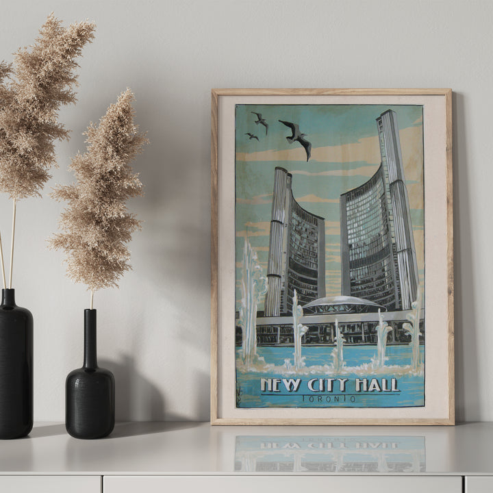 New City Hall Poster by Rob Croxford in a wooden frame on a drawer with black mantel bottle