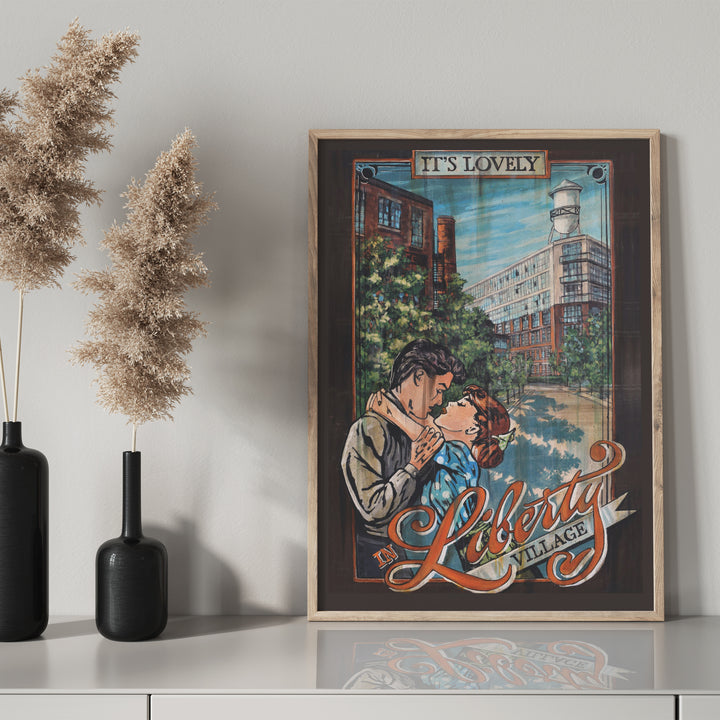 Liberty Village Toronto Poster by Rob Croxford in a wooden frame on drawer with black mantel