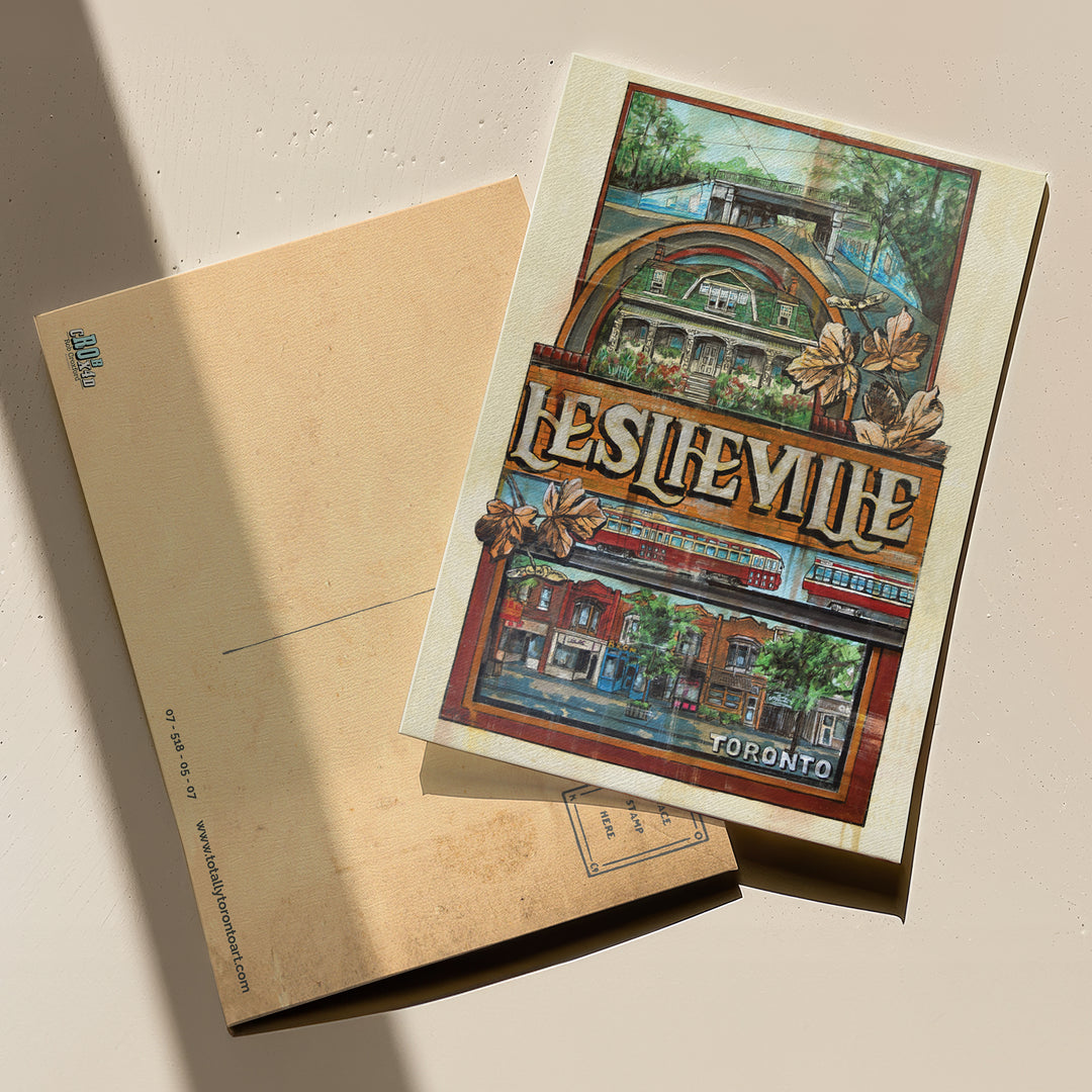 Leslieville Toronto Postcard by Rob Croxford with front and back end on table