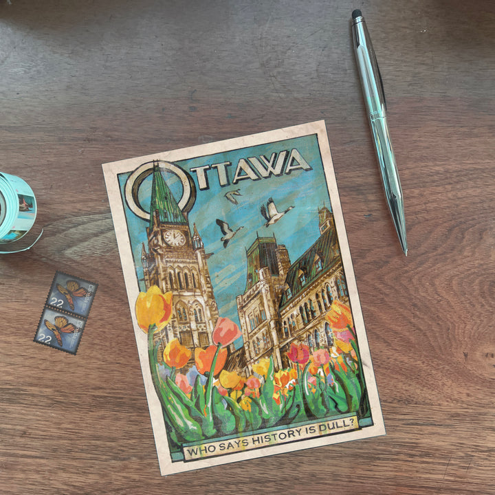 Ottawa Canada Postcard by Rob Croxford on wooden desk