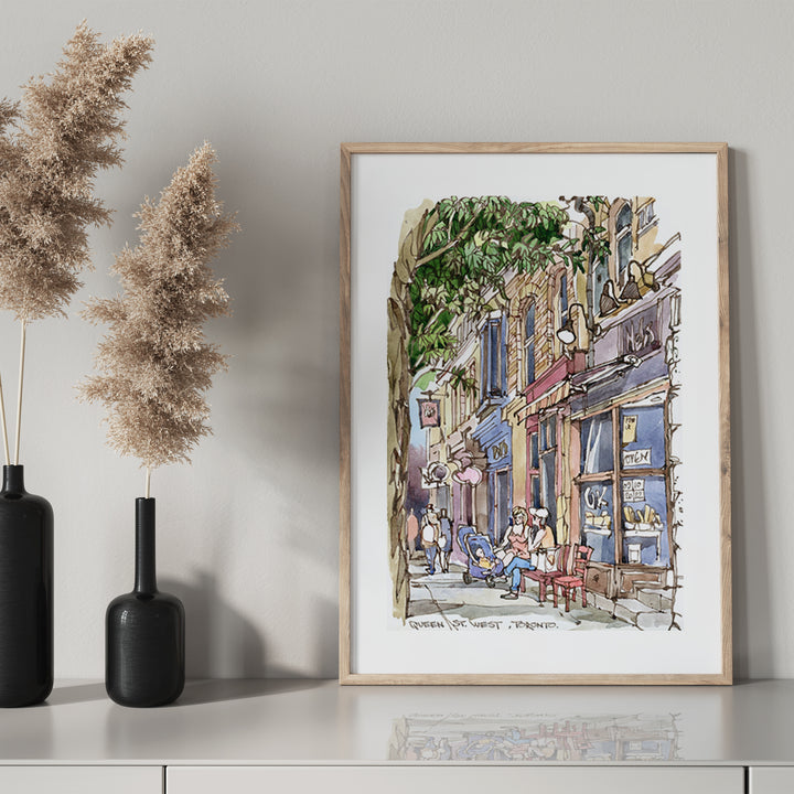 Queen Street Vibe Toronto Poster in a glass frame with a Black mantel bottle