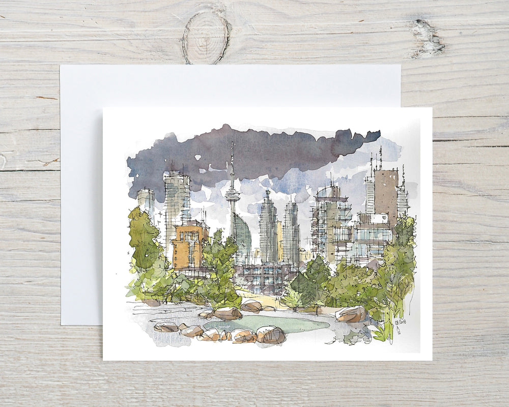 Stormy Toronto Skyline  Greeting Card Grey Flatlay on a white wood Desk