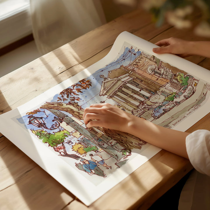 Roncesvalles Avenue Toronto Poster being unrolled on sunlight dappled desk