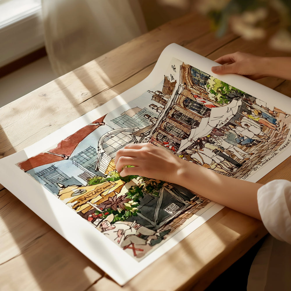 Market Street Toronto Poster being unrolled on sunlight dappled desk