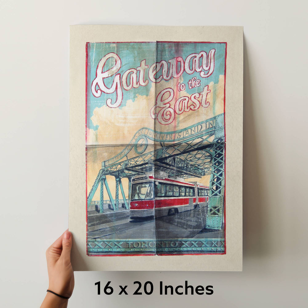 Queen St. East Bridge 16 X  20 Poster bein held up by a hand