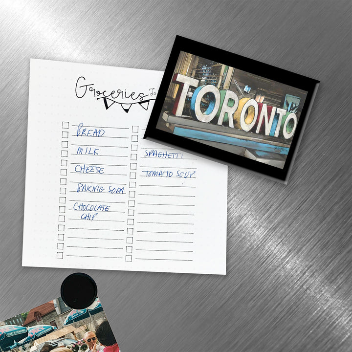 Toronto Sign Fridge Magnet on fridge with grocery list