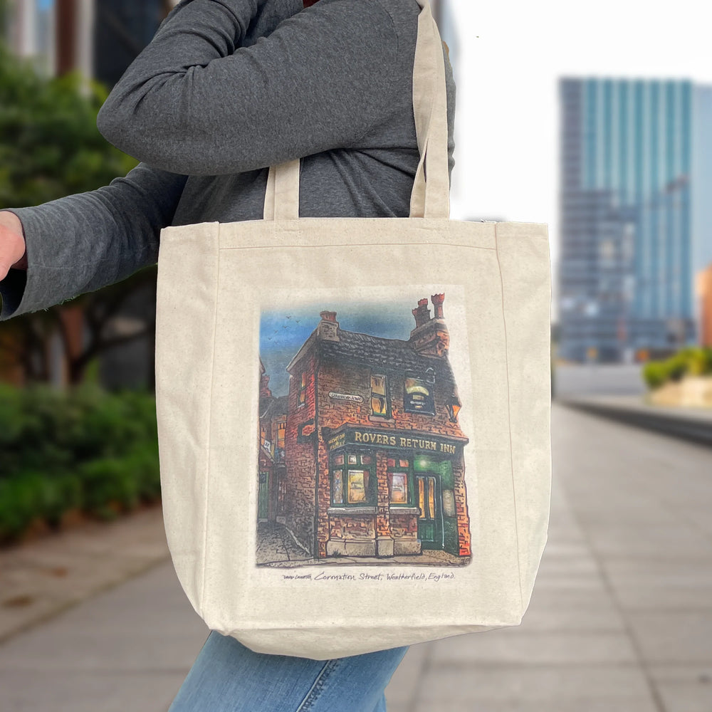 Woman with Rovers Return Canvas Tote on her shoulder on a downtown city city