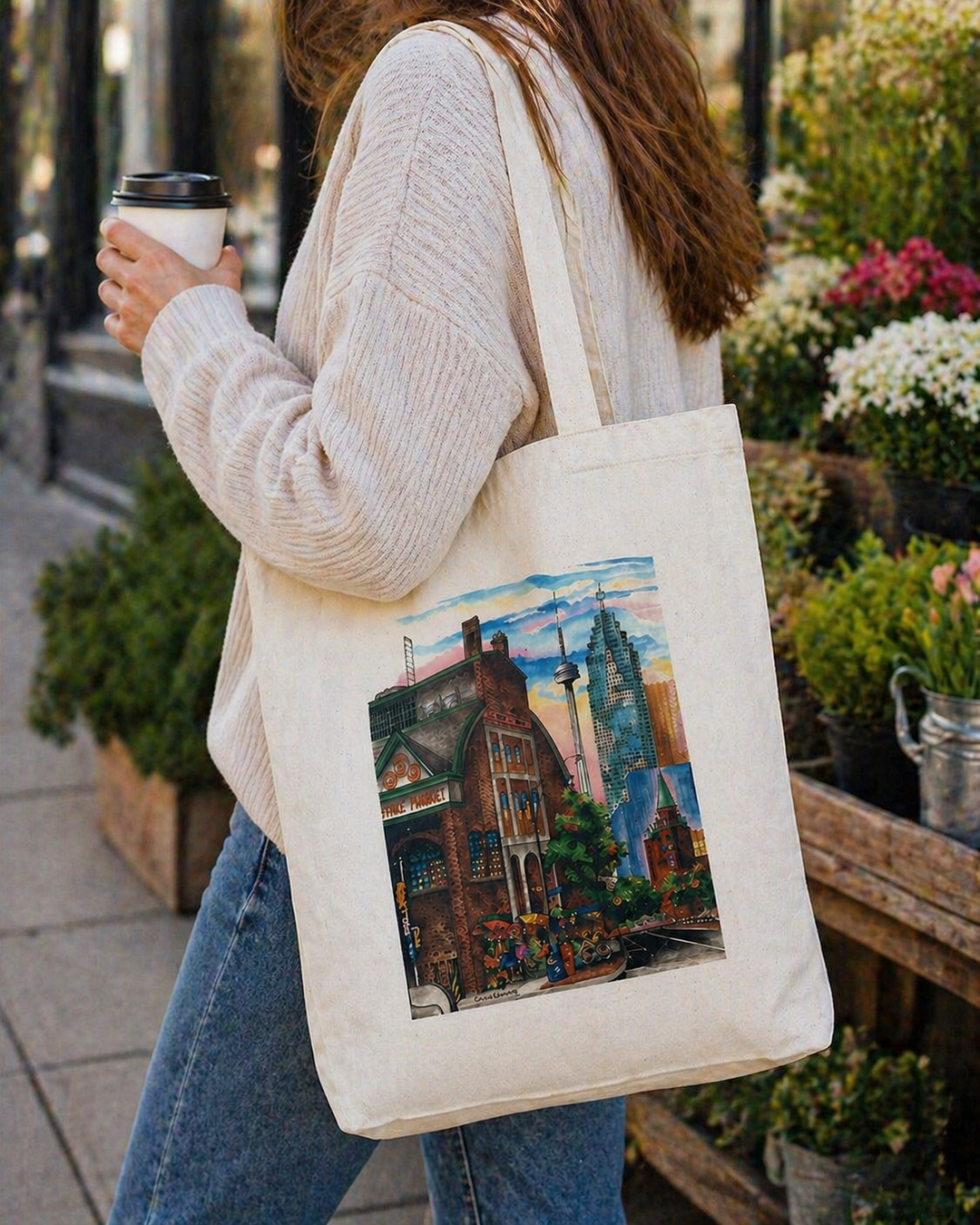 St. Lawrence Market Toronto Tote Bag Souvenir — canvas tote carried at a Toronto farmers market, illustrated by David Crighton